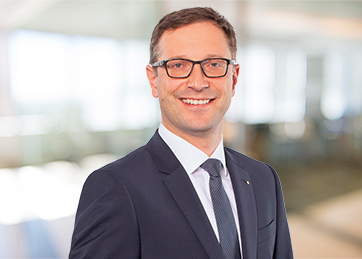 Dr. Holger Achtermann, Geschäftsbereichsleiter Legal <br> Vorstand, Betriebswirt (BA)